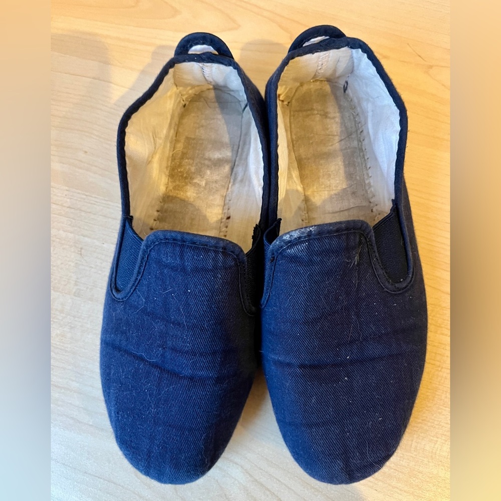 Navy slip ons